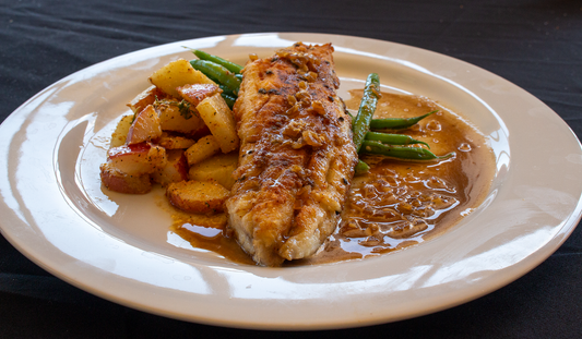 Pan Sauteed Speckled Trout with Creole Meuniere Sauce, Herbed Potatoes and Sauteed Green Beans